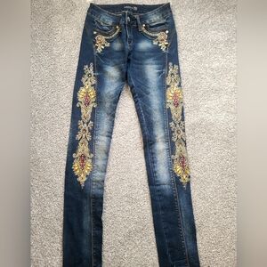 Blue Skinny Jeans with Floral Embellishments